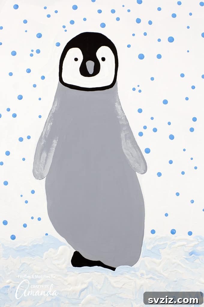 31 Fun Winter Craft Ideas for Little Ones 7 Footprint Penguin Art: A Fun and Messy Toddler Winter Craft