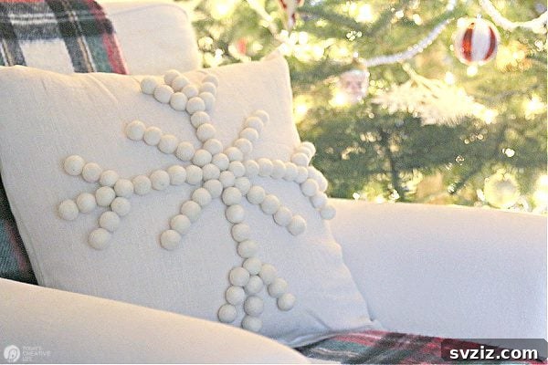DIY snowflake pillow with beaded accents, a cozy winter decor item