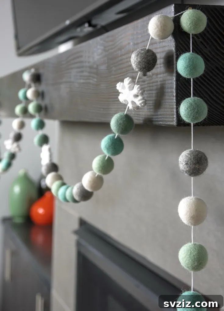 Colorful winter felt ball garland, perfect for holiday and seasonal decor
