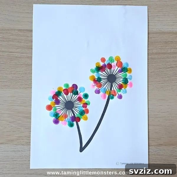 Charming fingerprint dandelion art for kids, using yellow paint for fingerprints to create dandelion heads, perfect for personalized cards.