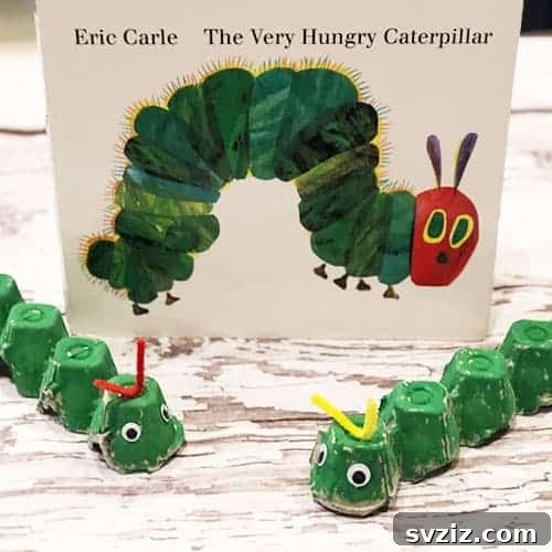 The Very Hungry Caterpillar activity made from an egg carton, painted green with red head, promoting literary connections and imaginative play.
