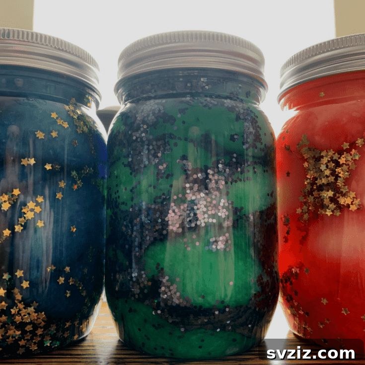 Calming galaxy in a jar sensory bottle with glitter, food coloring, and cotton balls, ideal for toddlers for quiet time and visual stimulation.