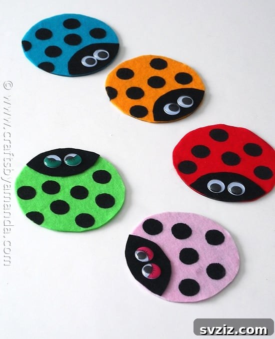 Recycled CD ladybug craft for kids, featuring painted CDs with googly eyes and pipe cleaner antennae, promoting upcycling and creativity.