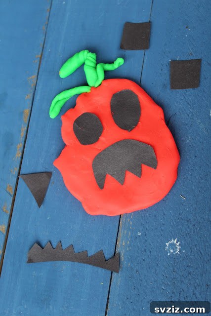 41 Amazing Pumpkin Creations 11 playdough pumpkin faces