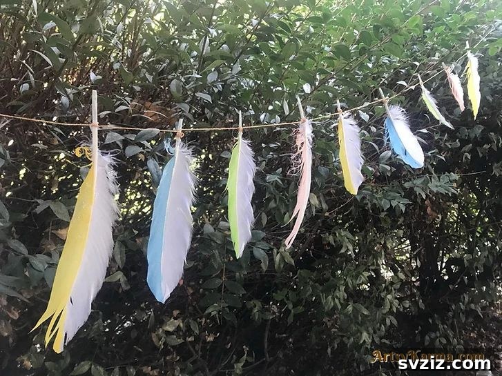 41 Brilliant Feather Projects 18 springtime feather garland