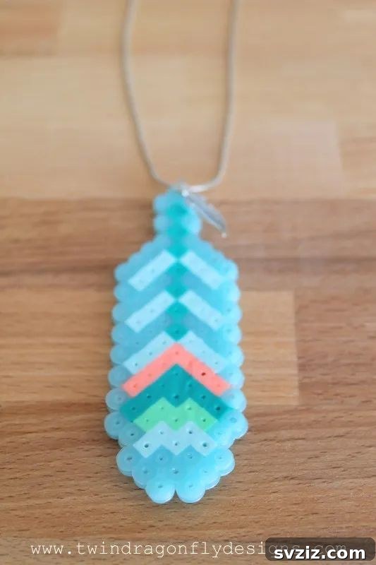 41 Brilliant Feather Projects 3 feather perler bead necklace