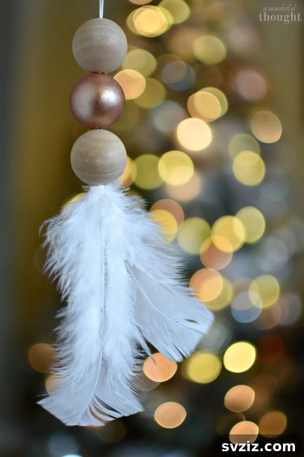 41 Brilliant Feather Projects 25 wooden bead feather ornament
