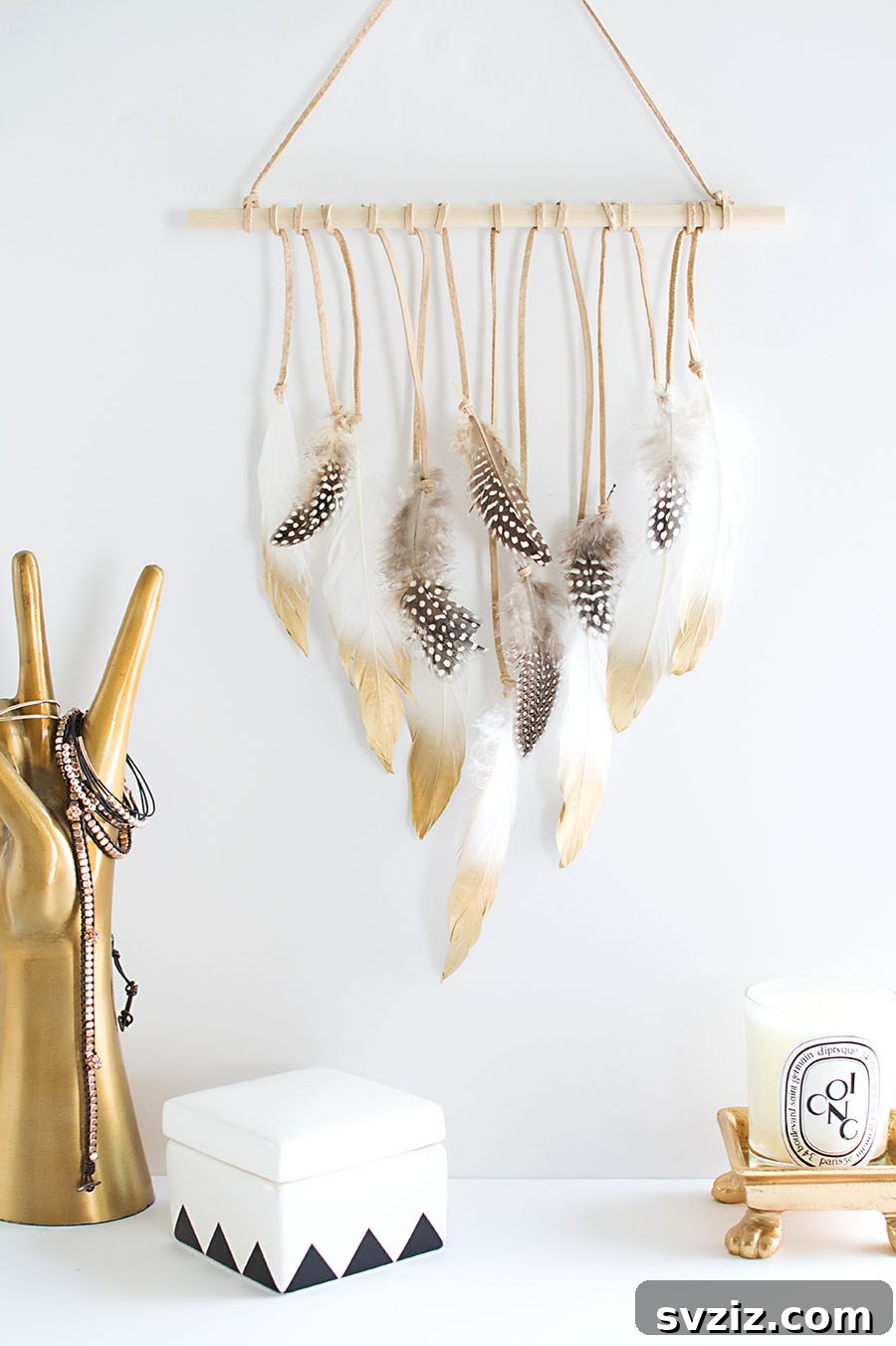 41 Brilliant Feather Projects 34 DIY feather wall hanging