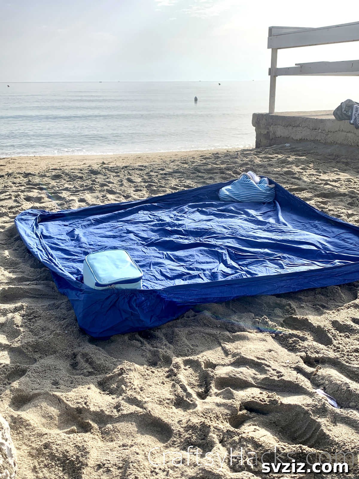 21 Game-Changing Beach Hacks for Your Next Trip 17 use a fitted sheet for a sand free space