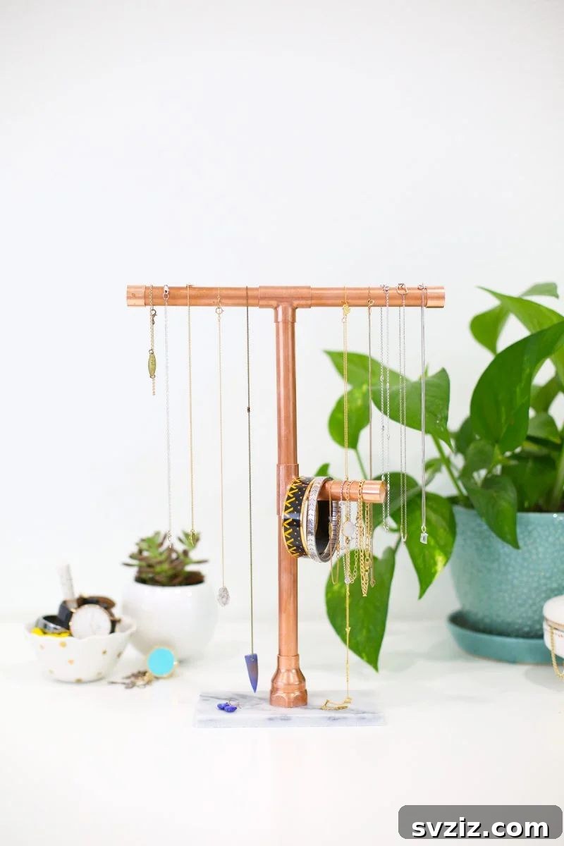 31 Brilliant Copper Designs 17 DIY copper and marble jewelry stand for organized accessories
