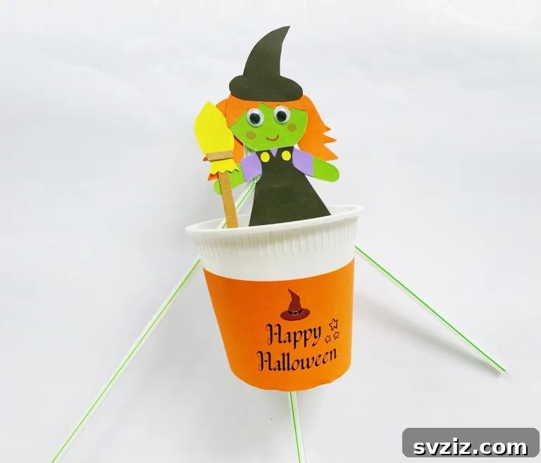 Charming and Eerie Witch Craft Projects 11 A simple craft showing a flying witch figure rising from a cup.