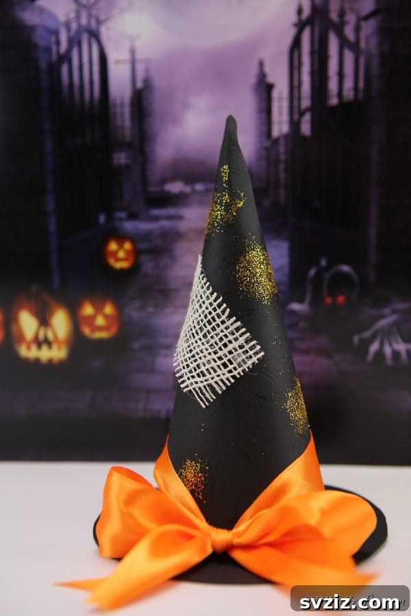 Charming and Eerie Witch Craft Projects 20 A creatively decorated witch hat, perfect for Halloween display.
