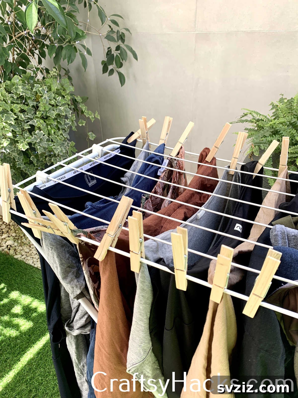 Efficiently save space on your drying rack by clipping clothes horizontally using clothespins, allowing more items to air dry simultaneously and optimizing rack capacity.
