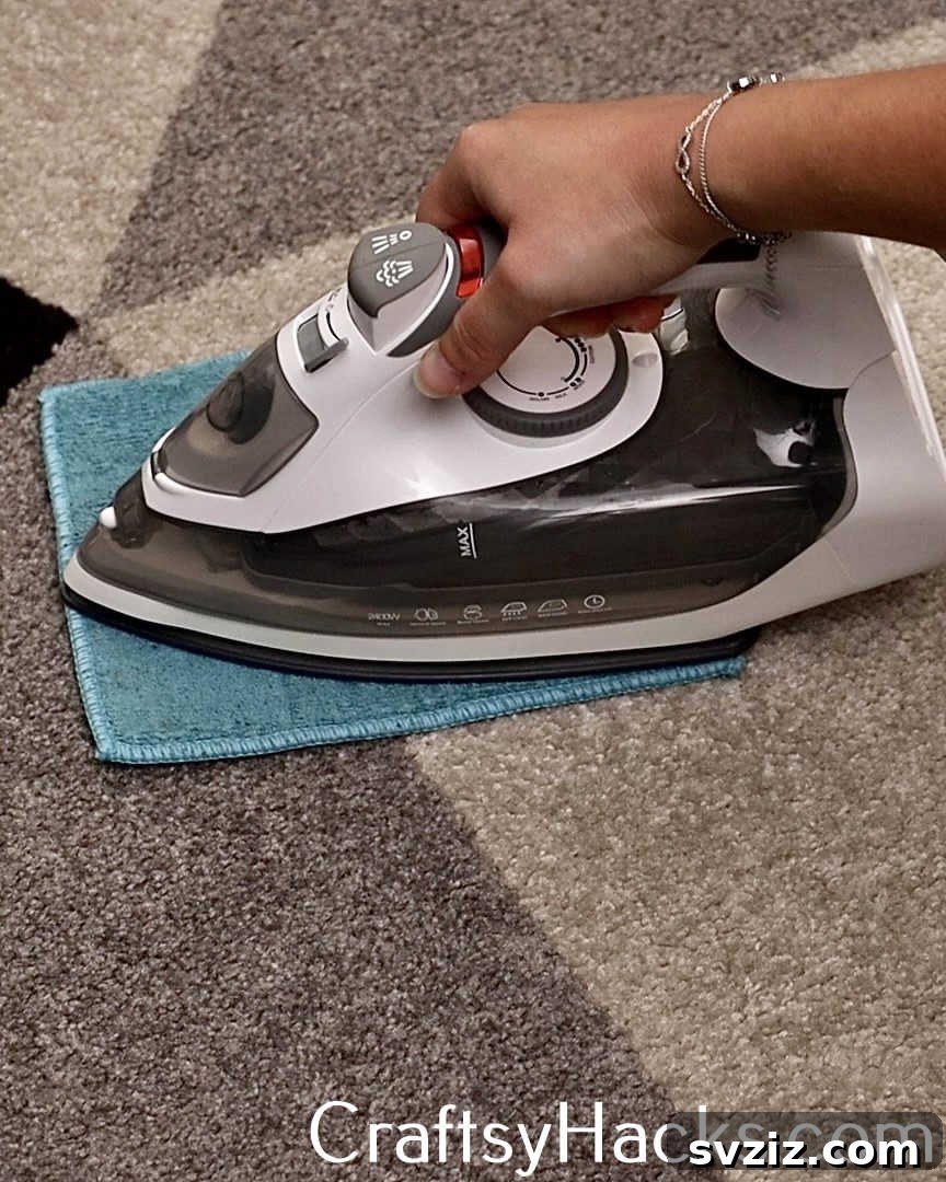 Remove stubborn furniture indentations from carpets quickly and easily by applying steam with a damp cloth and a hot iron, restoring the carpet's plush texture.