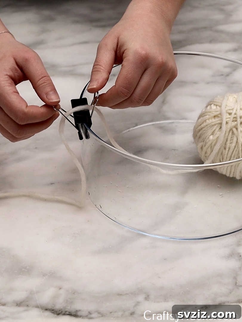25 Brilliant Tricks to Simplify Your Life 22 use a binder clip to hold ball of yarn in place