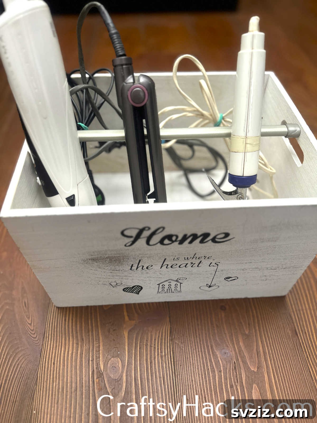 Utilize a tension rod under a bathroom sink or cabinet to hang hair straighteners and curling irons, saving counter space.