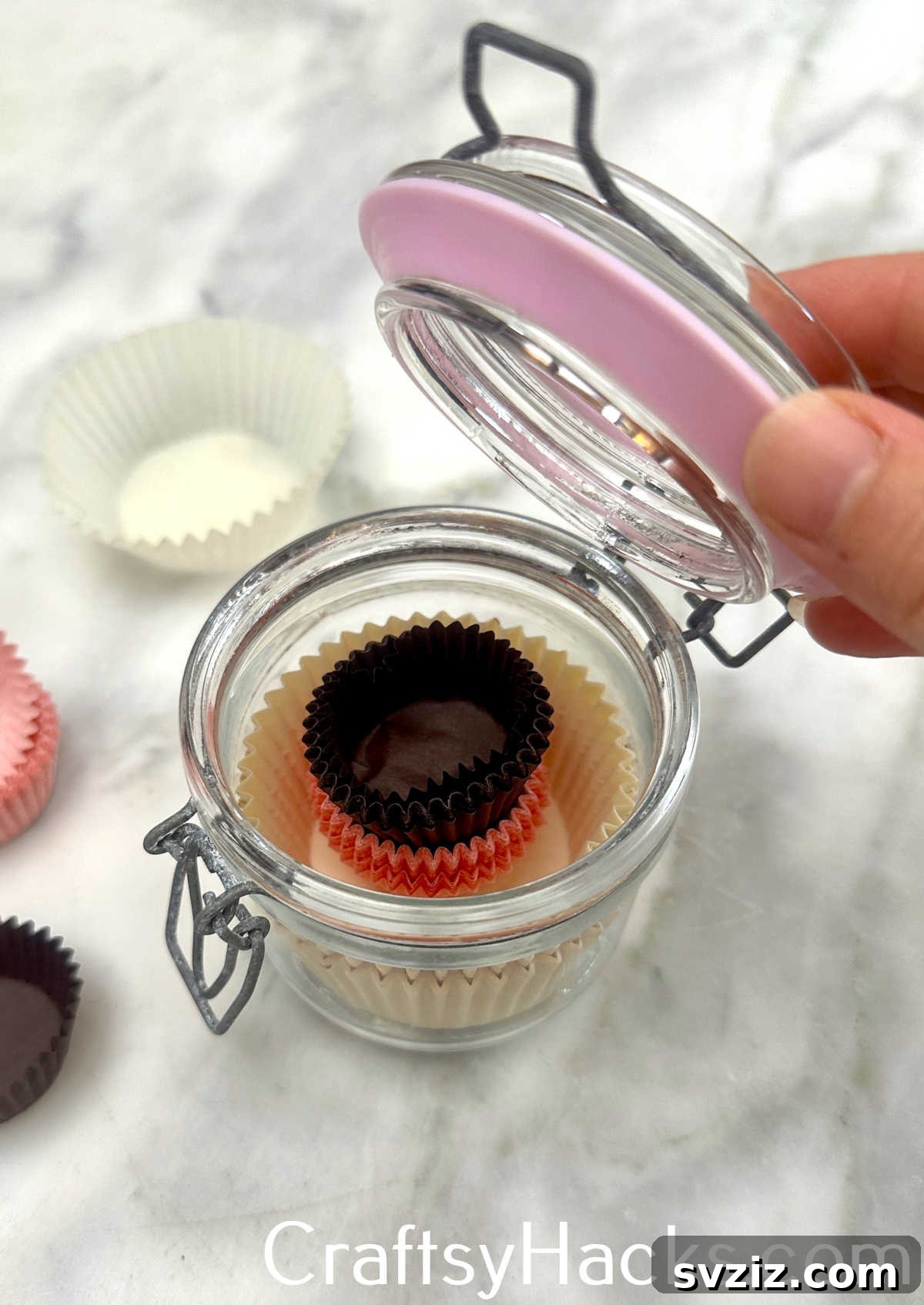 Keep small paper cups for baking or crafts tidy by storing them in a clear, lidded jar.