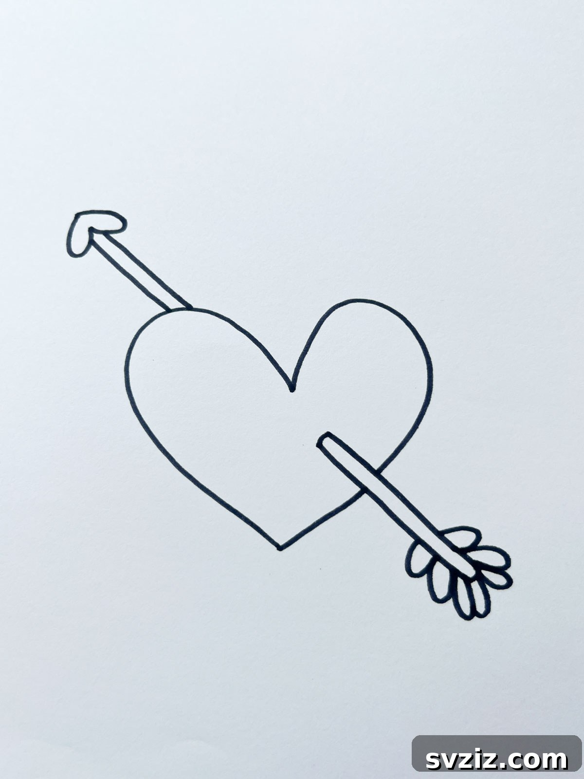 A classic drawing of a heart pierced by an arrow, symbolizing being struck by love or affection.