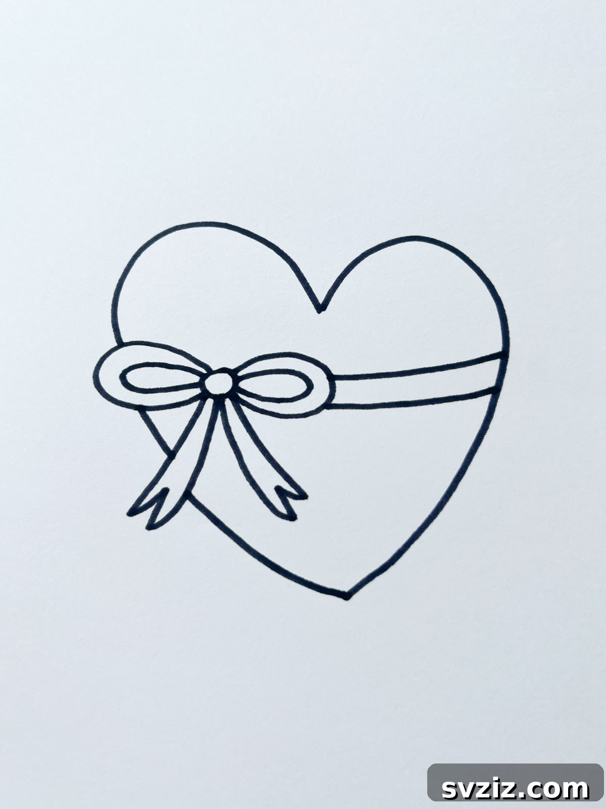 A festive drawing of a present wrapped in a heart shape, symbolizing a gift of love and affection.