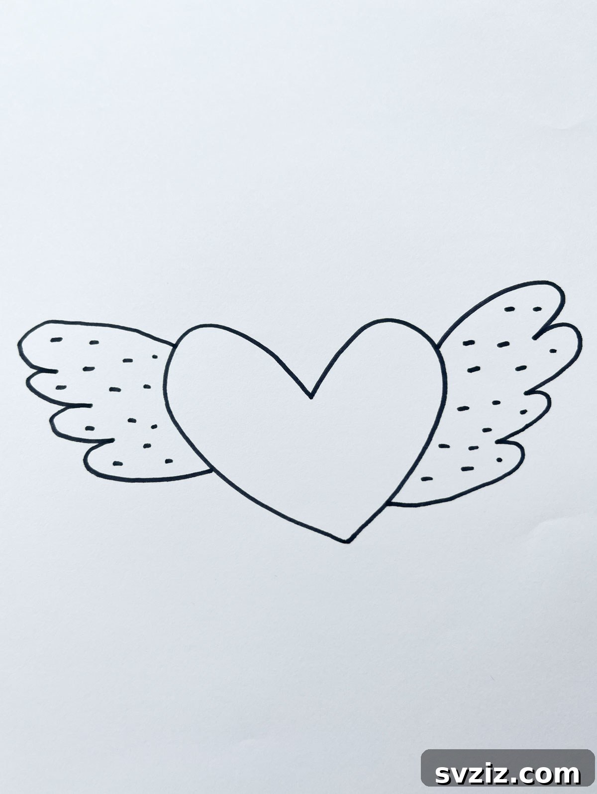 A powerful drawing of a heart with elegant wings, symbolizing freedom, transcendence, and soaring love.