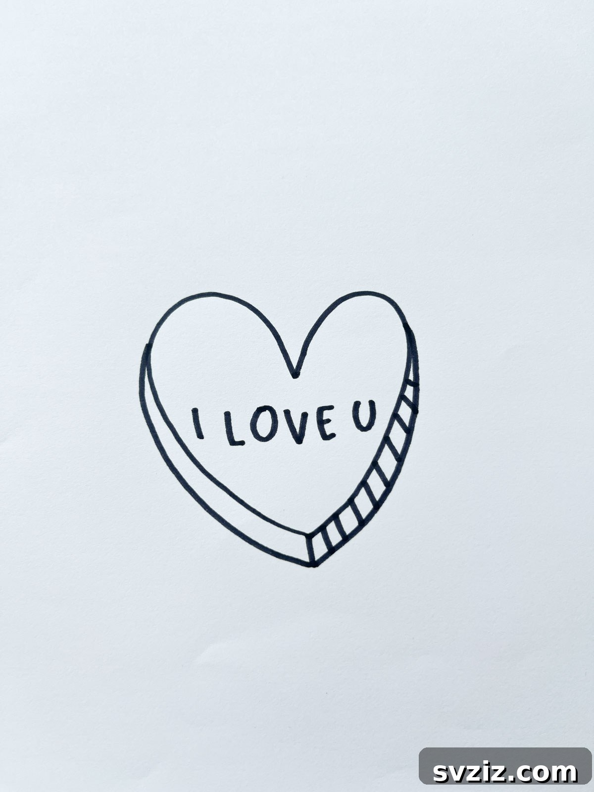 A drawing of a candy heart with 'I Love You' text, evoking nostalgia and sweetness.