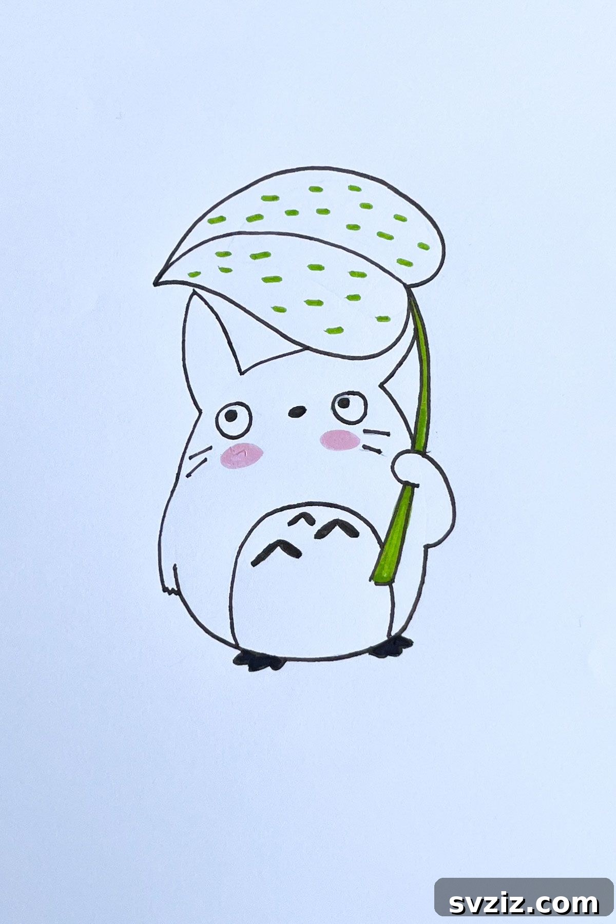 Effortless Anime Art: 31 Drawing Prompts 17 Anime drawing of the large grey Totoro from My Neighbor Totoro, holding a leaf over its head, depicted with a gentle and iconic expression.