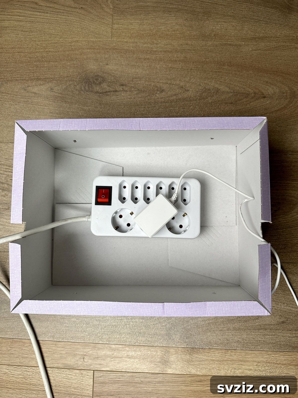 Cut the Sides of a Box to Hide the Power Strip