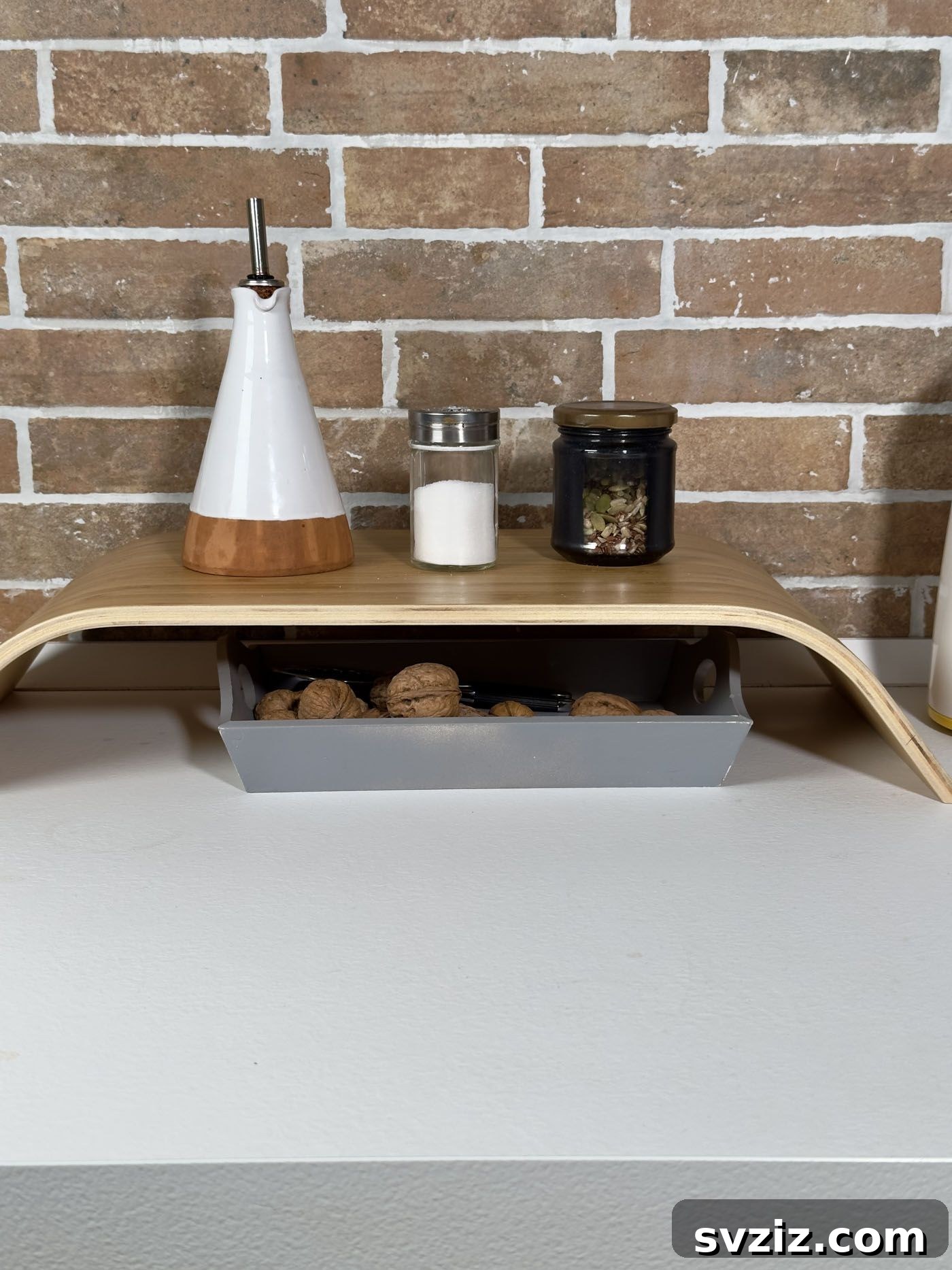 21 Creative Kitchen Organization Ideas 11 Kitchen cabinet organized with shelf risers