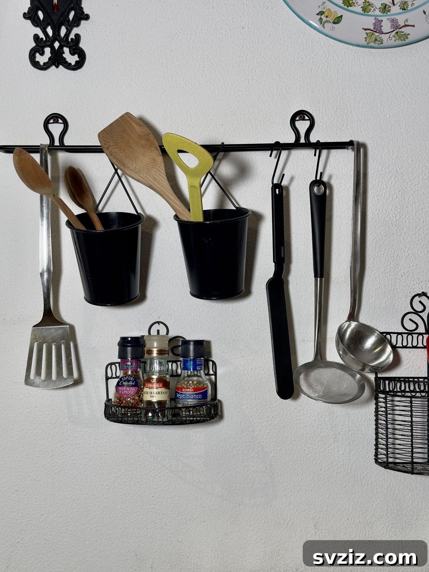 21 Creative Kitchen Organization Ideas 7 Kitchen utensils stored in wall-mounted baskets