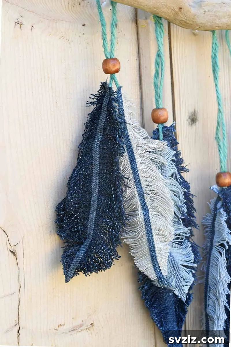 Create a Bohemian Oasis: Inspiring Wall Decor Ideas 9 Upcycled Denim Feather Wall Decor with Driftwood