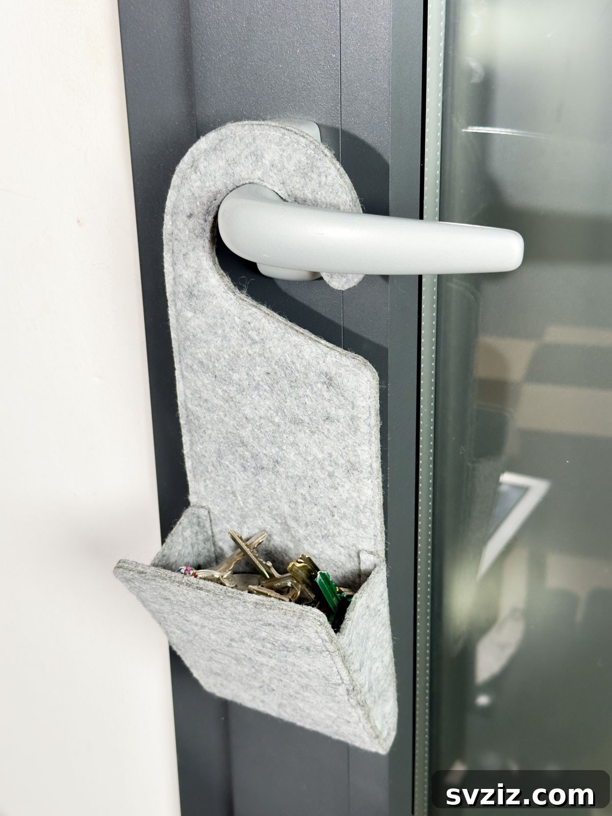 21 Clever Ways to Declutter Your Home Without Spending a Fortune 16 Hang a Fabric Key Holder on a Door Handle