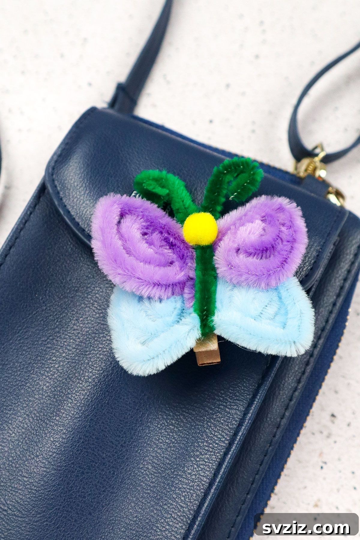 A collection of colorful pipe cleaner butterflies displayed together, showcasing the variety and beauty of the craft.