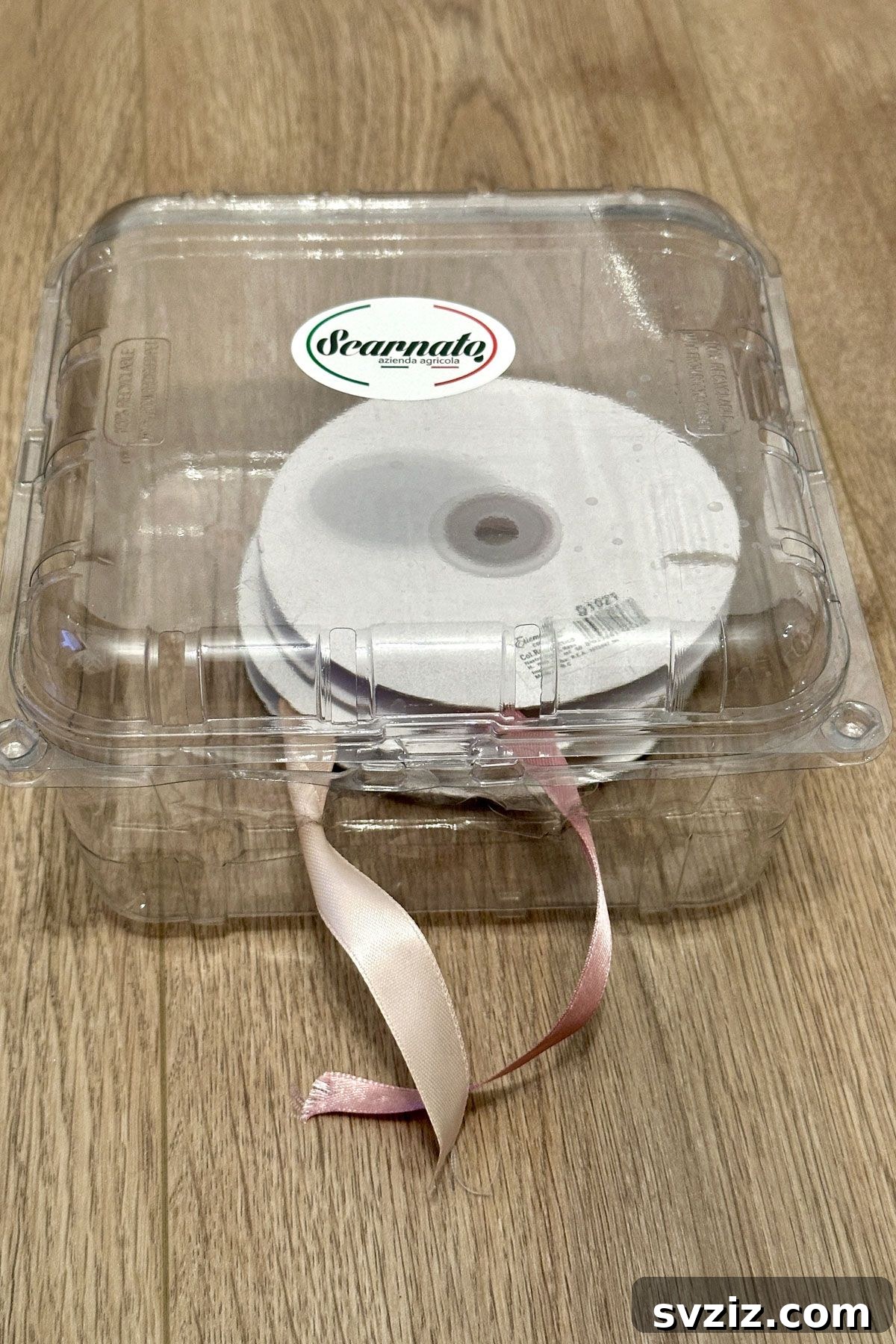 Craft room hack: keeping ribbons organized with a plastic container