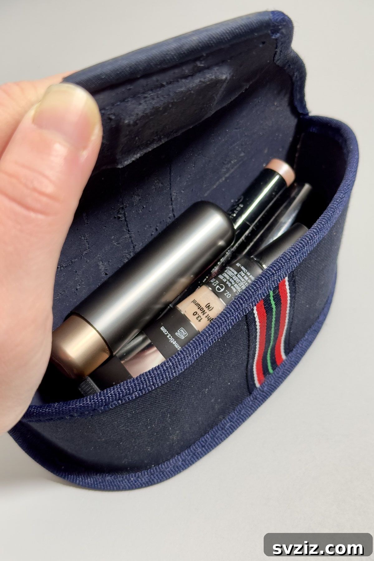 Travel hack: using a glasses case to carry small personal items