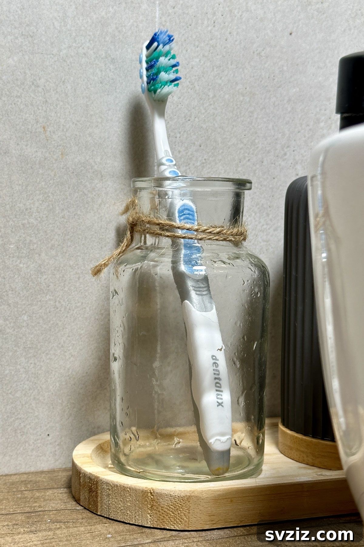 Bathroom organization: using a glass jar as a DIY toothbrush holder