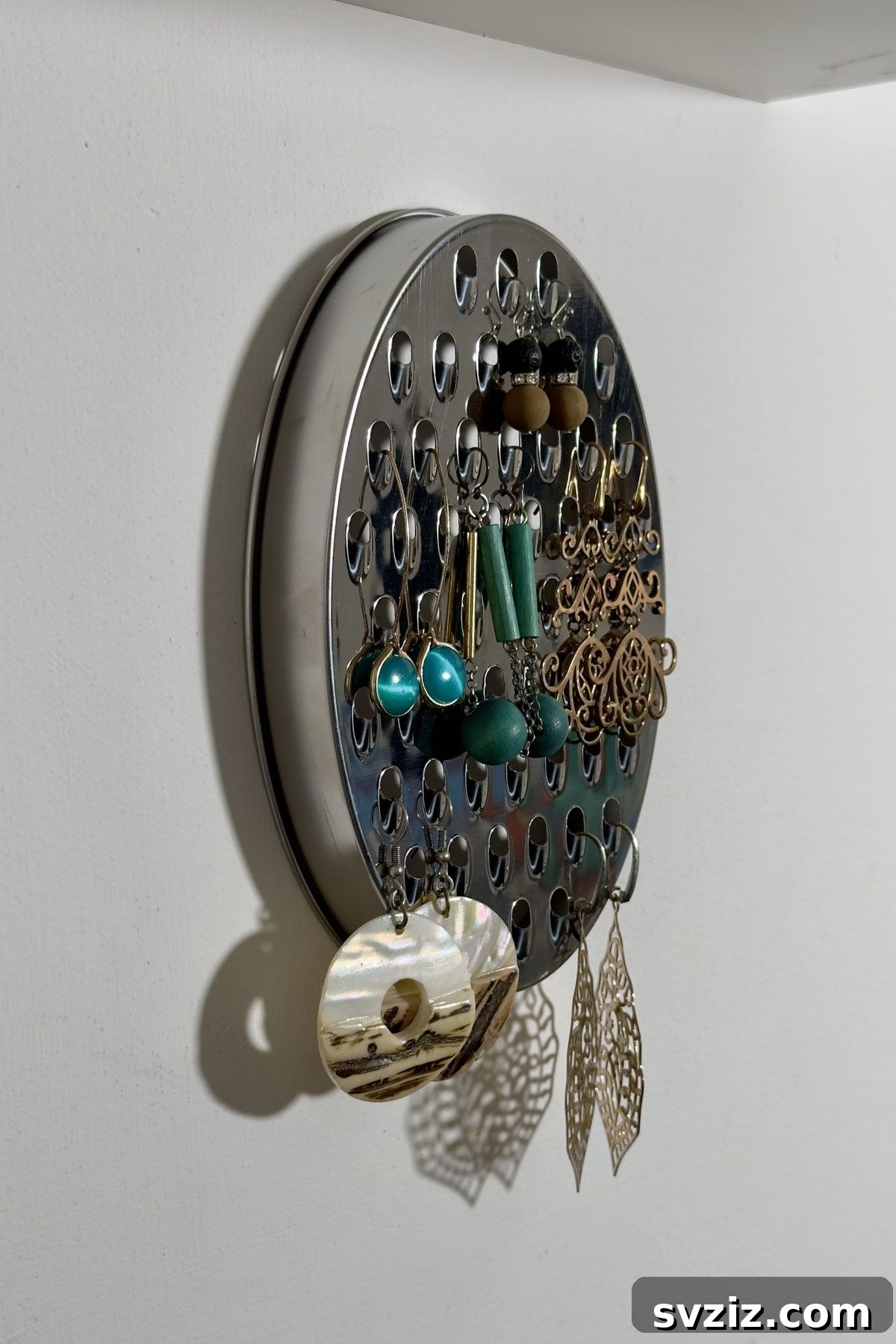 Clever upcycle: using a grater to organize earrings stylishly