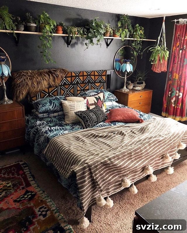 27 Captivating Dark Boho Bedroom Designs 12 Black Wall in a Dark Boho Bedroom