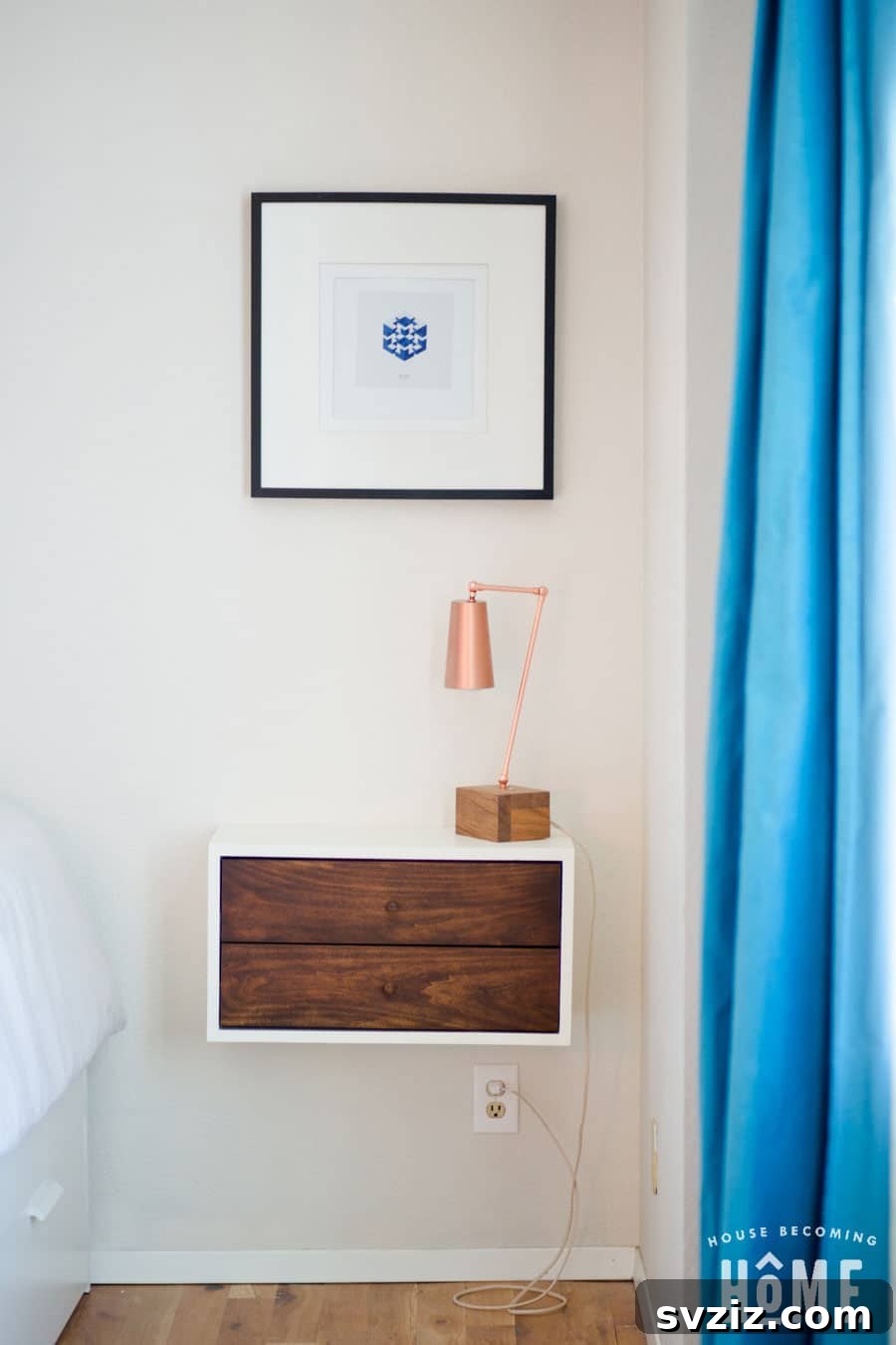 21 Ingenious Ways to Transform Small Bedrooms 9 A minimalist floating nightstand attached to the wall, saving floor space and maintaining a clean aesthetic in a small bedroom.