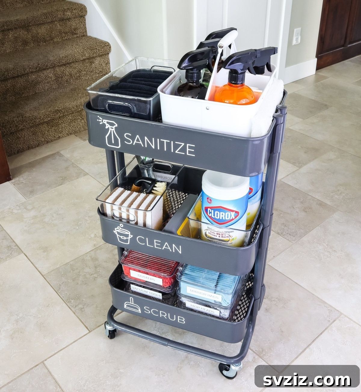 IKEA cart organized with various cleaning products, sprays, and sponges