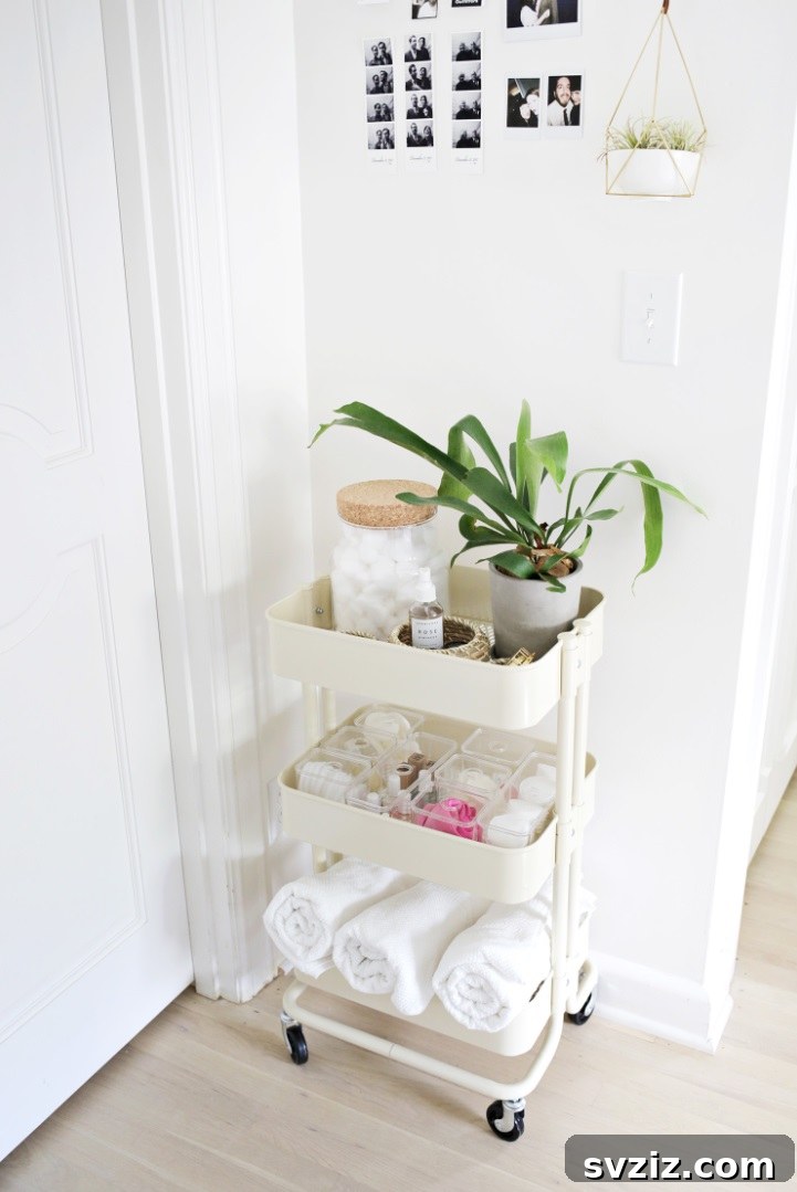 IKEA cart organized with towels, toiletries, and beauty products for a tidy bathroom