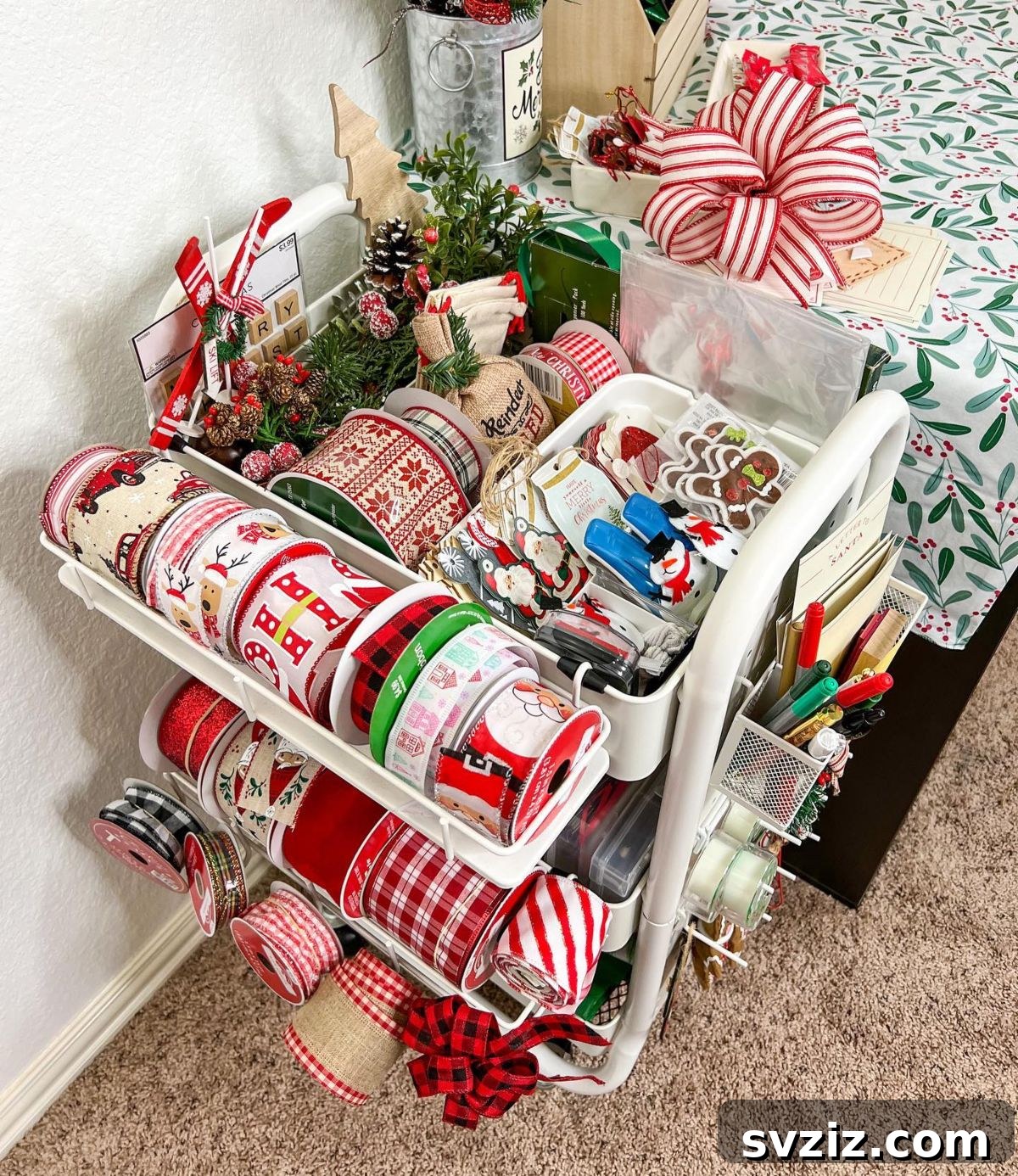 IKEA cart organized as a Christmas gift wrapping station with paper, ribbons, and tags