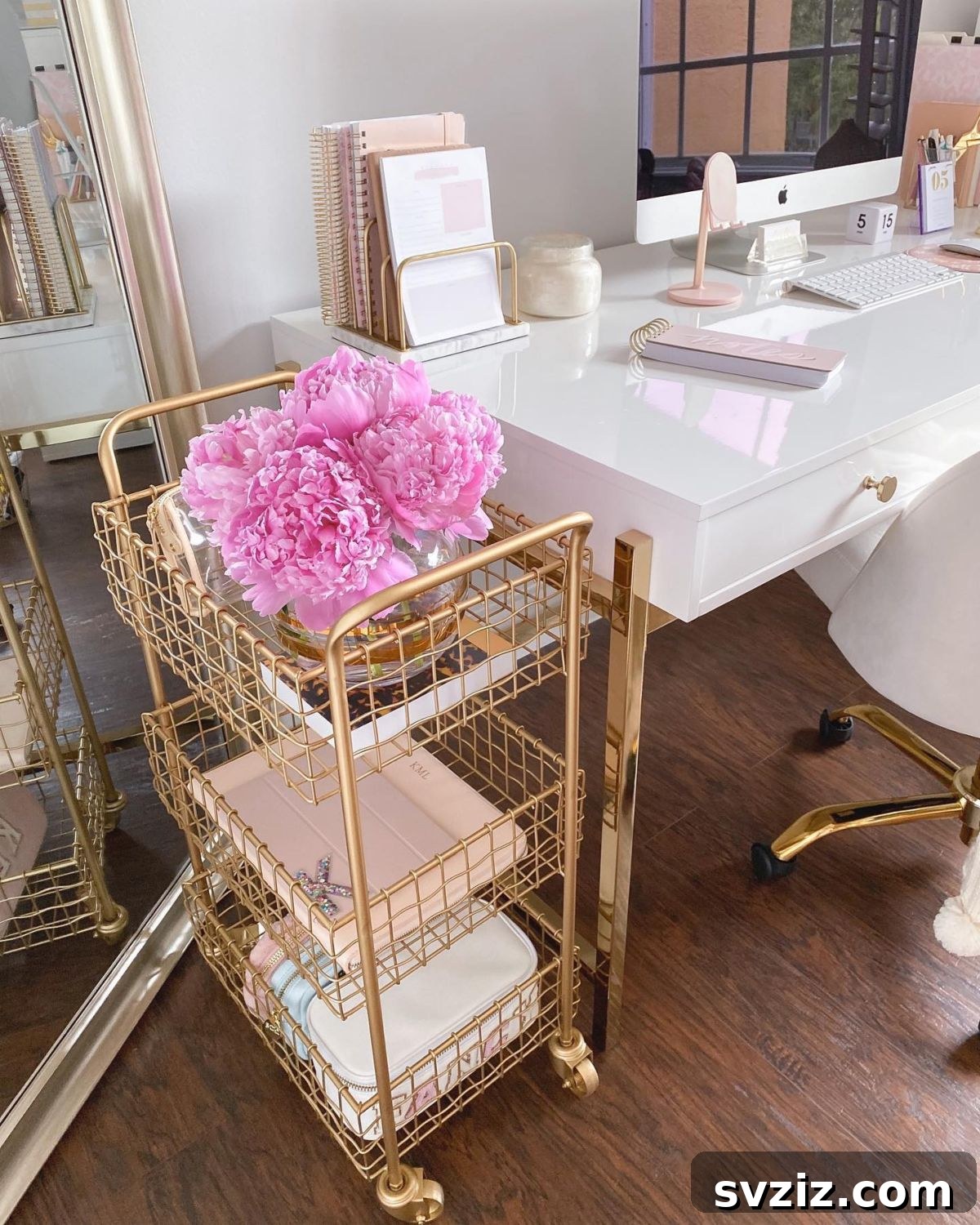 IKEA cart used for decorative display, featuring plants, books, and small accents