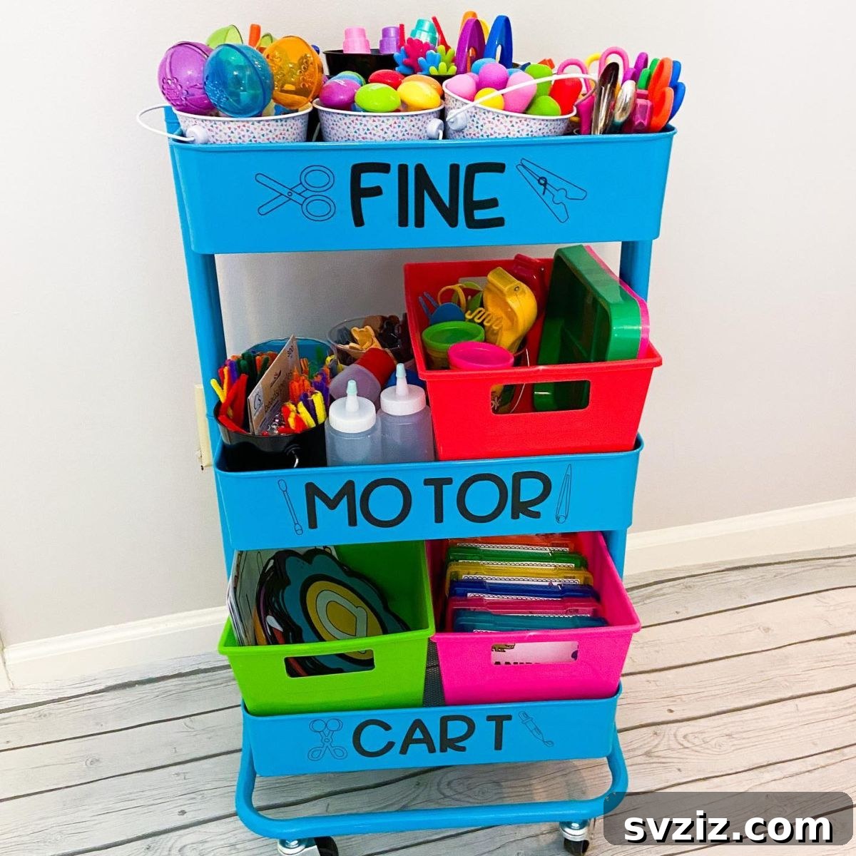 IKEA cart organized for toy storage with colorful bins for kids' items