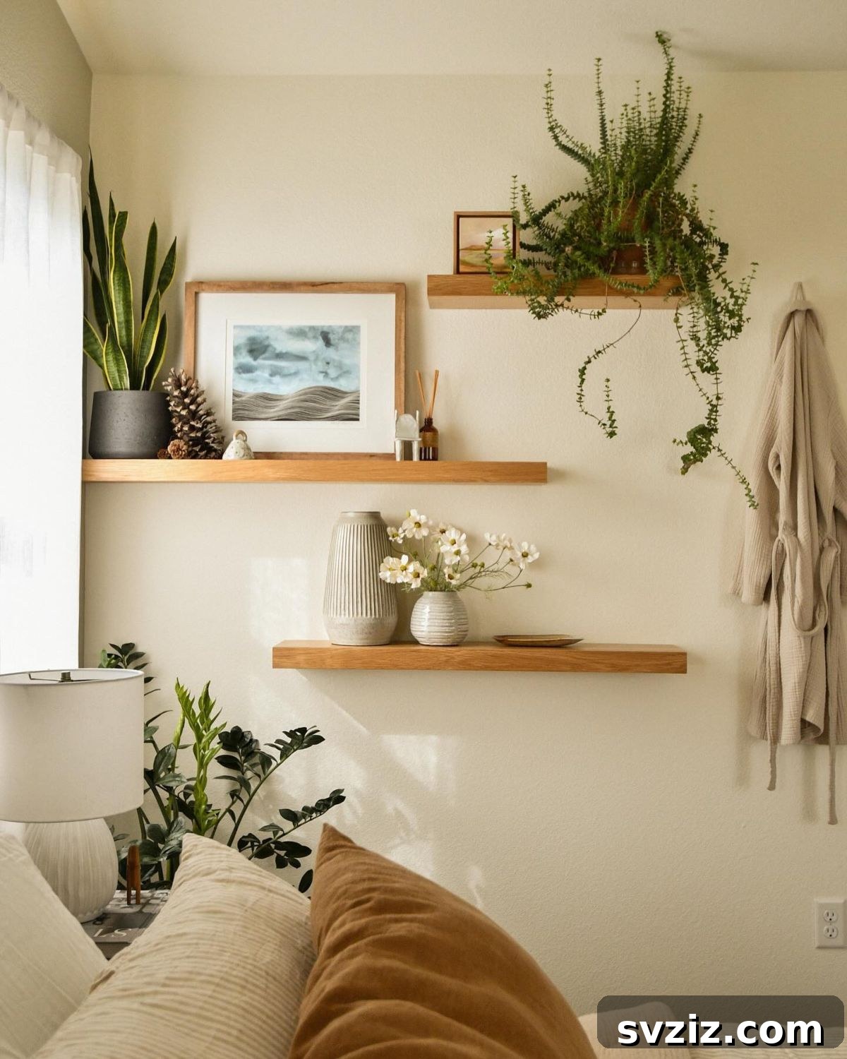 Smart Space Solutions for Couples Bedrooms 13 Stylish floating shelves adorned with plants, books, and decorative items, utilizing wall space to enhance a small bedroom's aesthetic without cluttering the floor.