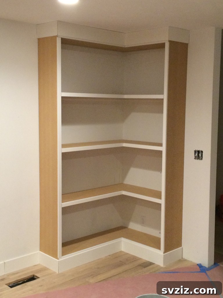 Smart Space Solutions for Couples Bedrooms 19 Compact corner bookshelf filled with books and small decor, utilizing an otherwise unused corner in a small bedroom.