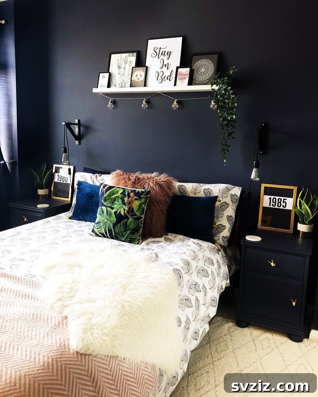 Smart Space Solutions for Couples Bedrooms 26 Small bedroom featuring a dramatic dark accent wall contrasted with lighter tones, creating depth and a sophisticated, cozy atmosphere.
