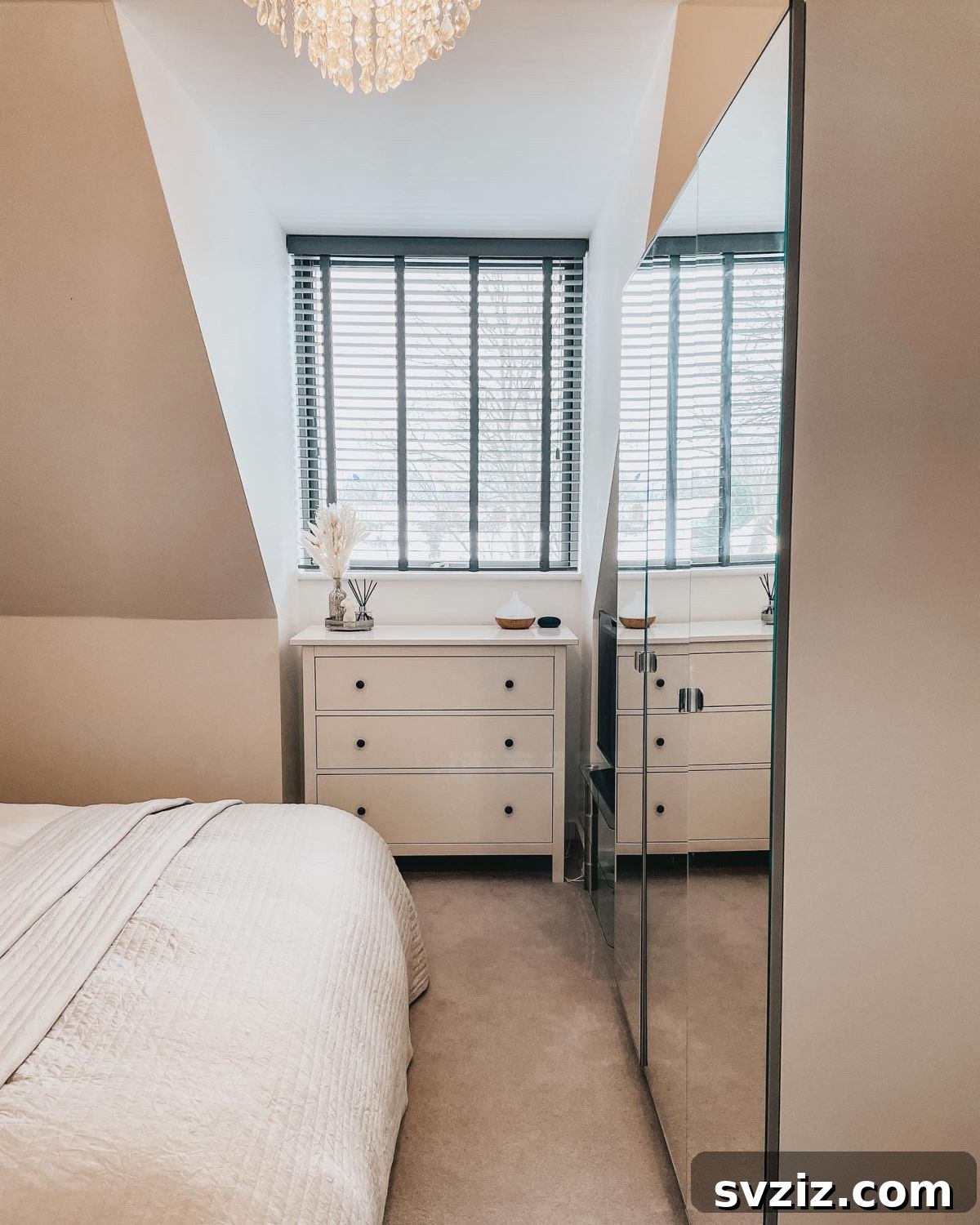 Smart Space Solutions for Couples Bedrooms 6 Wardrobe with elegant glass doors, reflecting light and creating an illusion of larger space in a bedroom, also serving as a full-length mirror.