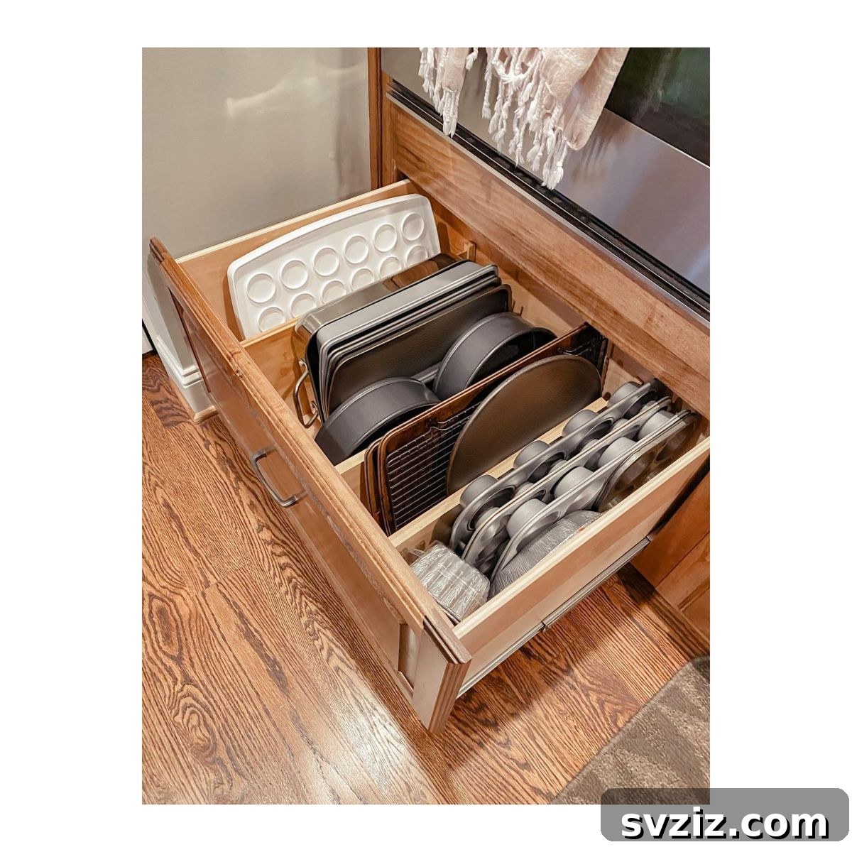 31 Genius Vertical Storage Hacks 16 Drawer dividers organizing baking sheets and trays vertically