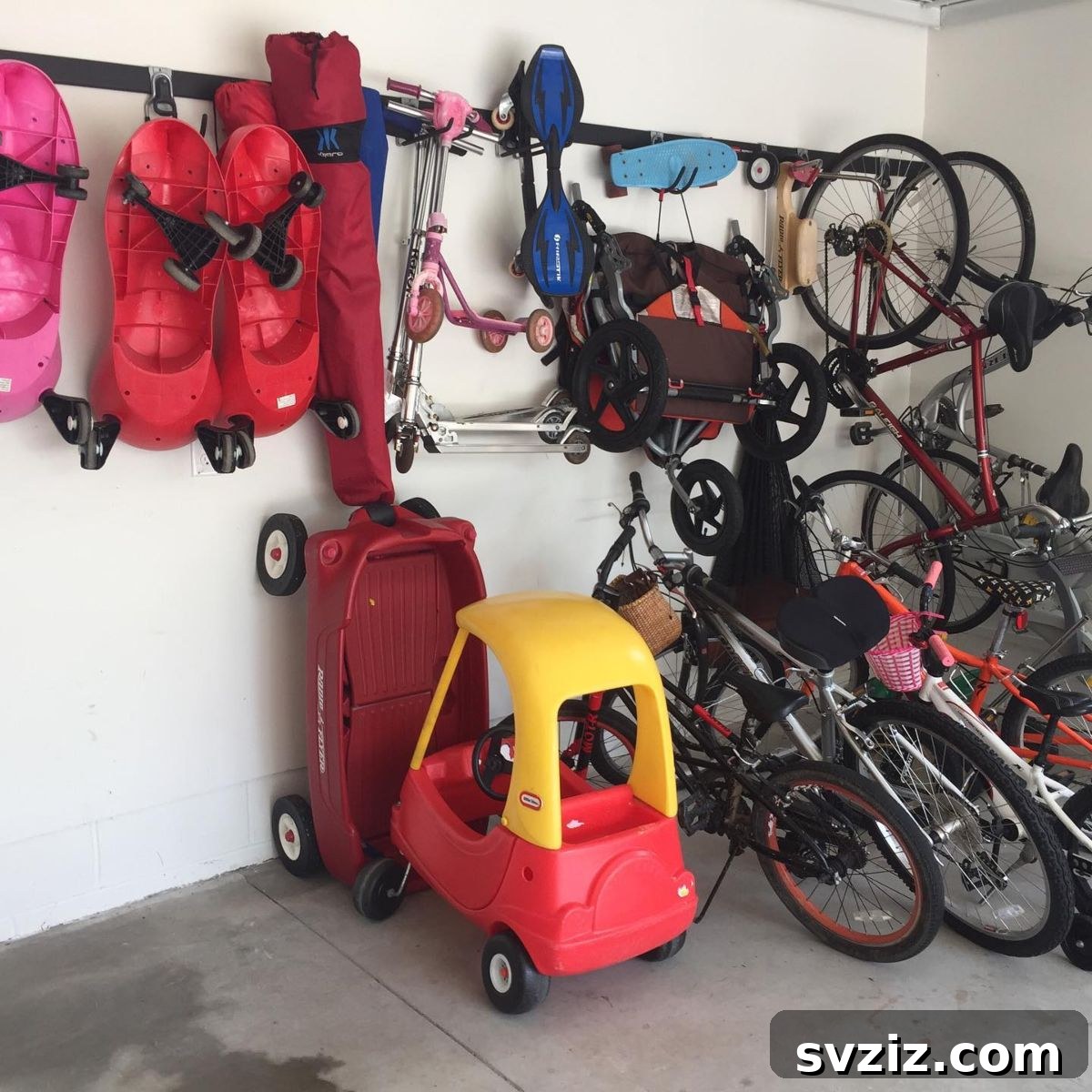 31 Genius Vertical Storage Hacks 28 Garage hanging storage system with shelves and hooks for tools and equipment