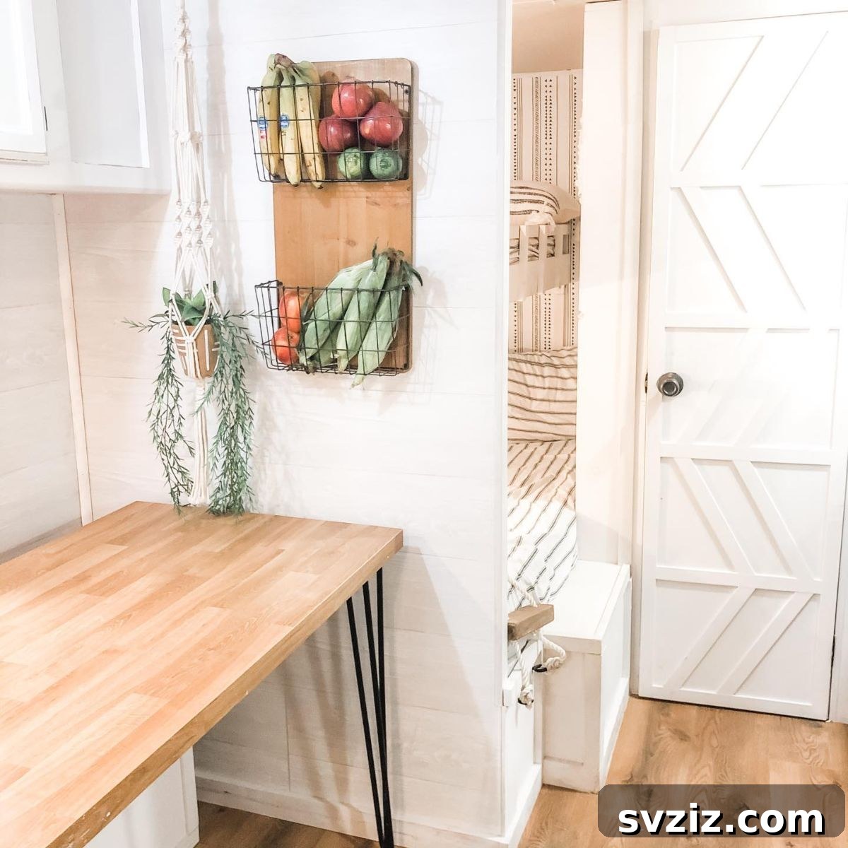 31 Genius Vertical Storage Hacks 7 Wall-mounted baskets for storing fresh produce in a kitchen